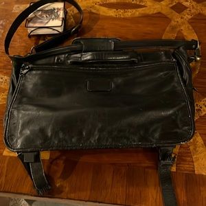 TUMI all leather black computer bag shows some wear great quality life remains